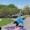 a man who golfs doing yoga outdoors at the north oaks golf club