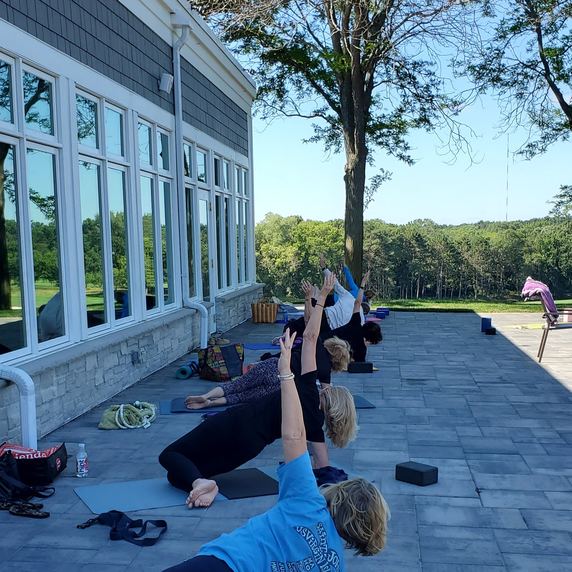 yoga on patio at north oaks golf club