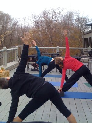 triangle pose yoga outdoors
